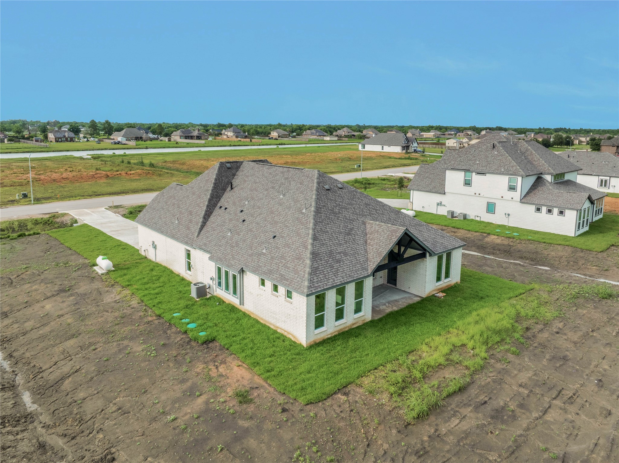 4602 Magnolia Bend Drive Rosharon, TX 77583 - Photo 35 of 39 an aerial view of a house with outdoor space and lake view