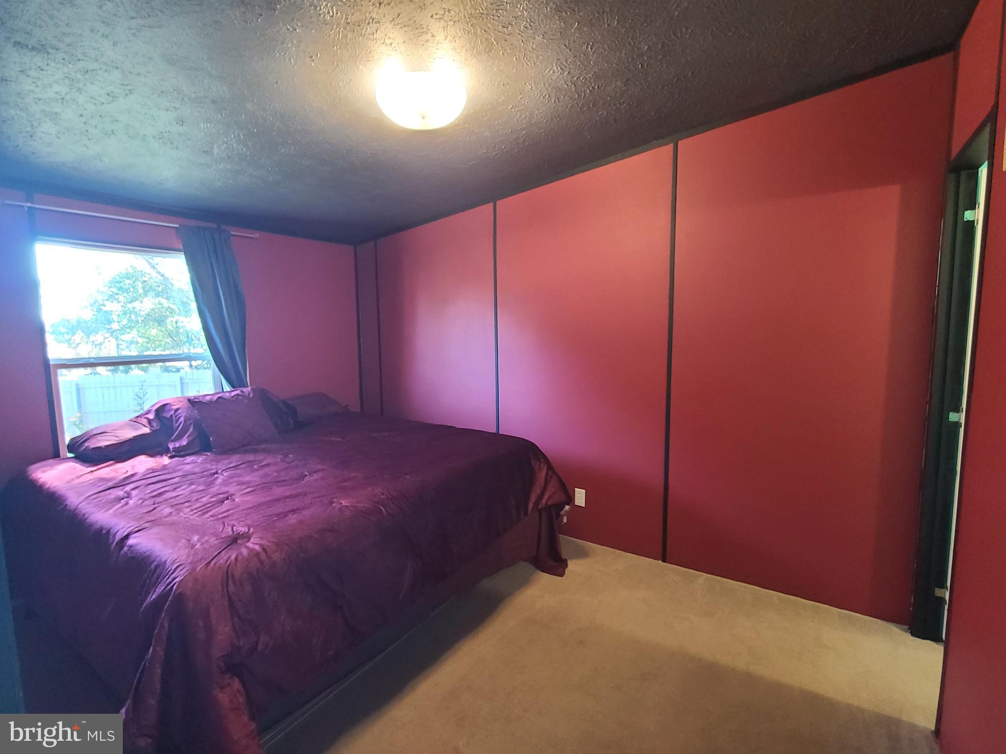 216 Meadow Trail Delta, PA 17314 - Photo 15 of 31 a bed sitting in a room next to a window