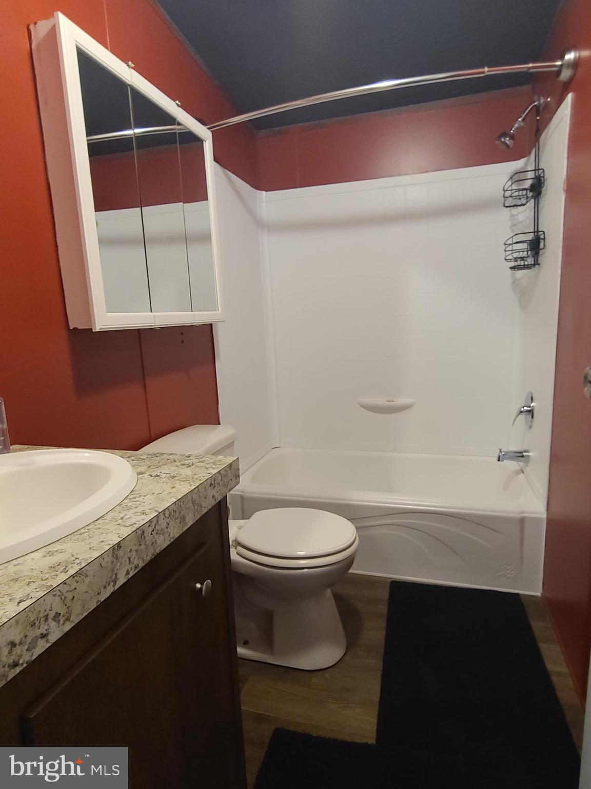 216 Meadow Trail Delta, PA 17314 - Photo 16 of 31 a bathroom with a granite countertop sink toilet and shower