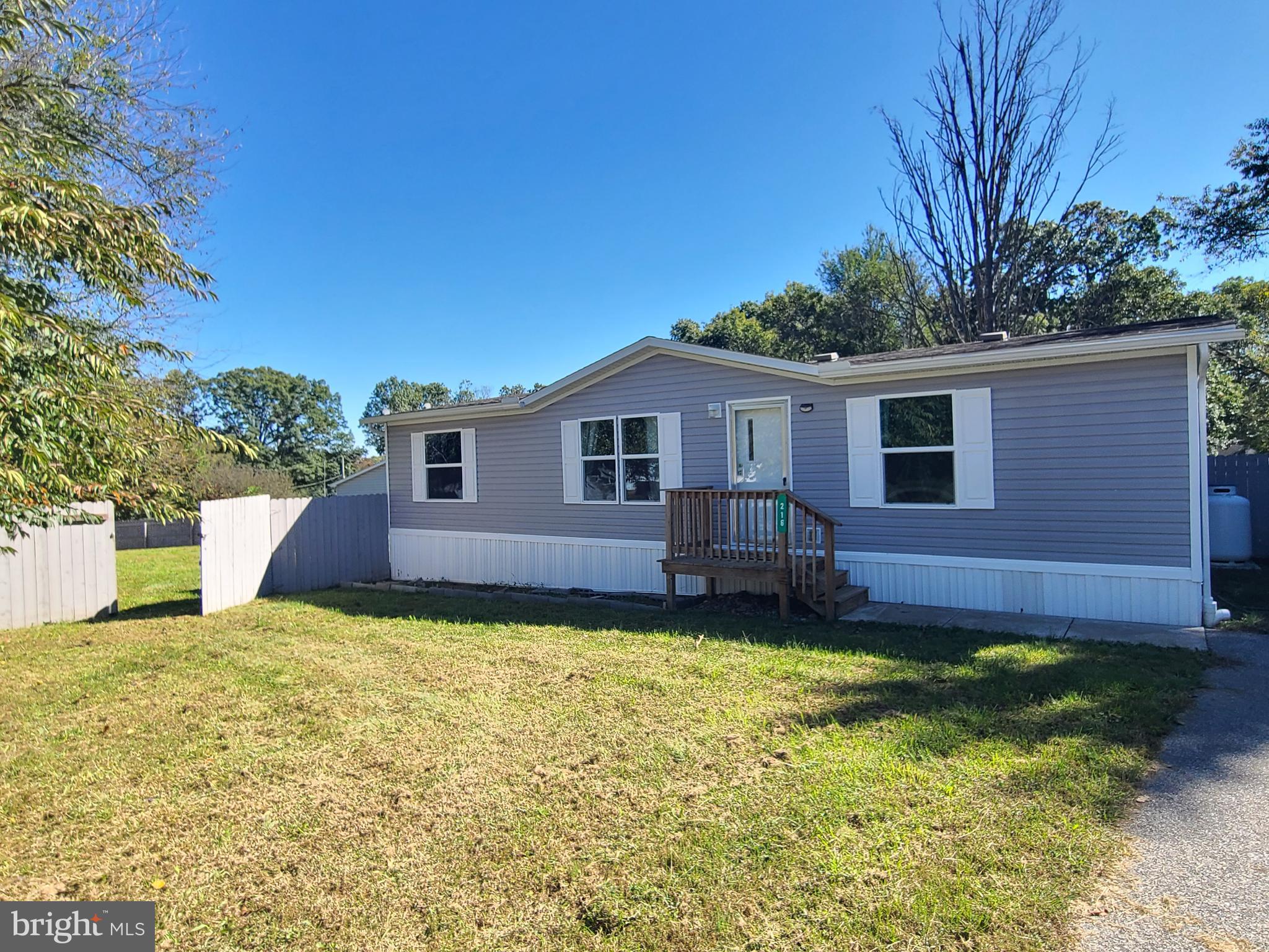 216 Meadow Trail Delta, PA 17314 - Photo 27 of 31 a view of a house with a yard and porch