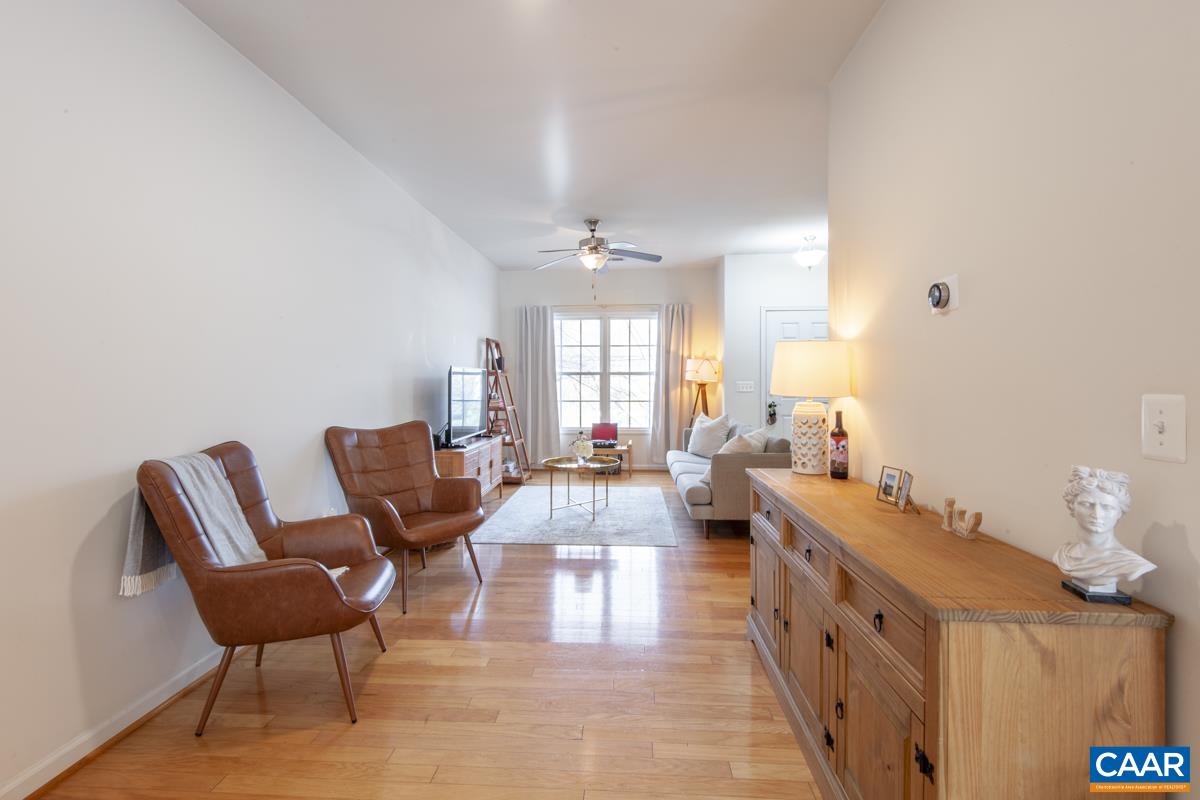 1048 5th Street Southwest Charlottesville, VA 22902 - Photo 15 of 36 a living room with furniture and a large window