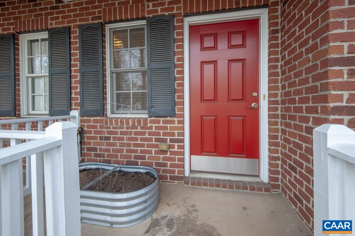 1048 5th Street Southwest Charlottesville, VA 22902 - Photo 35 of 36 a front view of a house with entryway