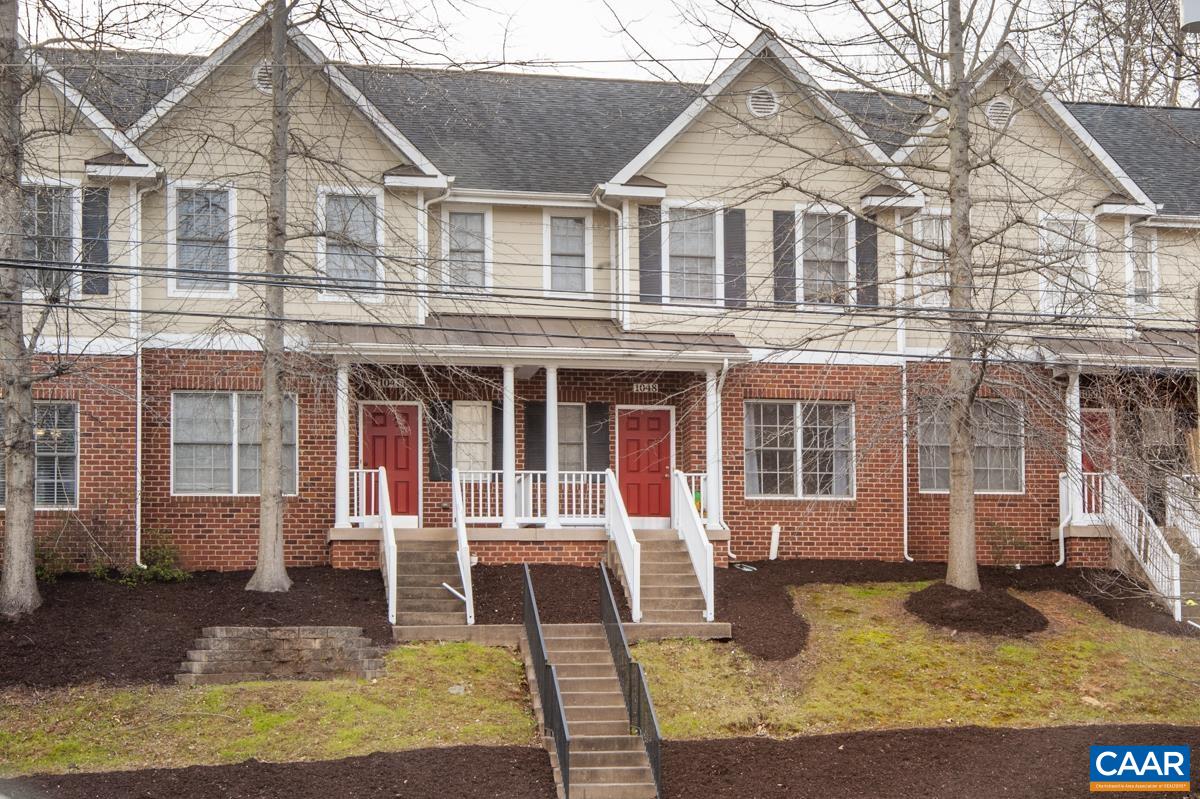 1048 5th Street Southwest Charlottesville, VA 22902 - Photo 6 of 36 a front view of a house with a yard