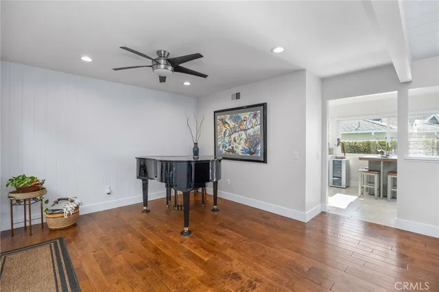 a view of a livingroom with furniture and a dinning table