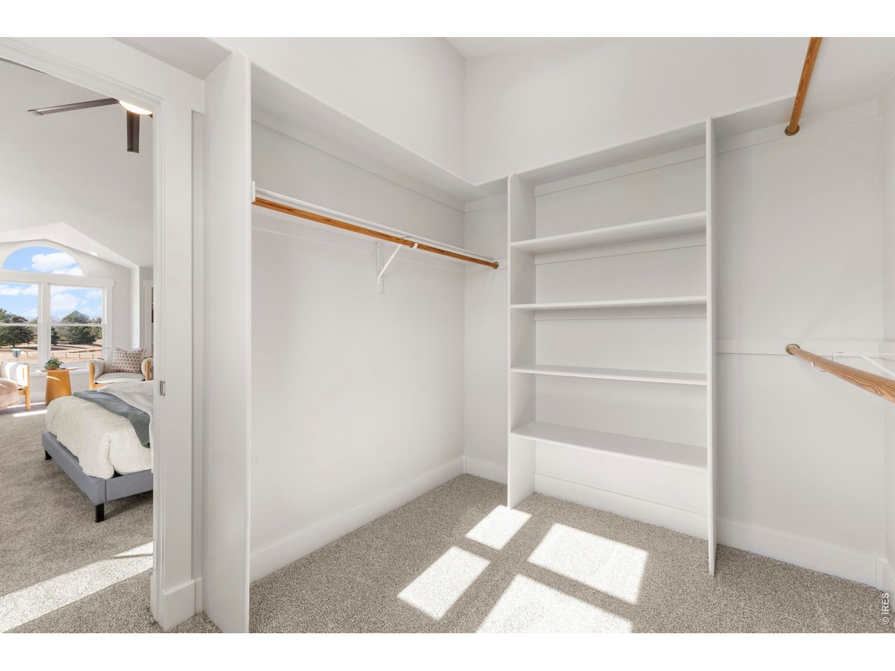 7766 Park Ridge Circle Fort Collins, CO 80528 - Photo 27 of 43 Primary Walk-in Closet