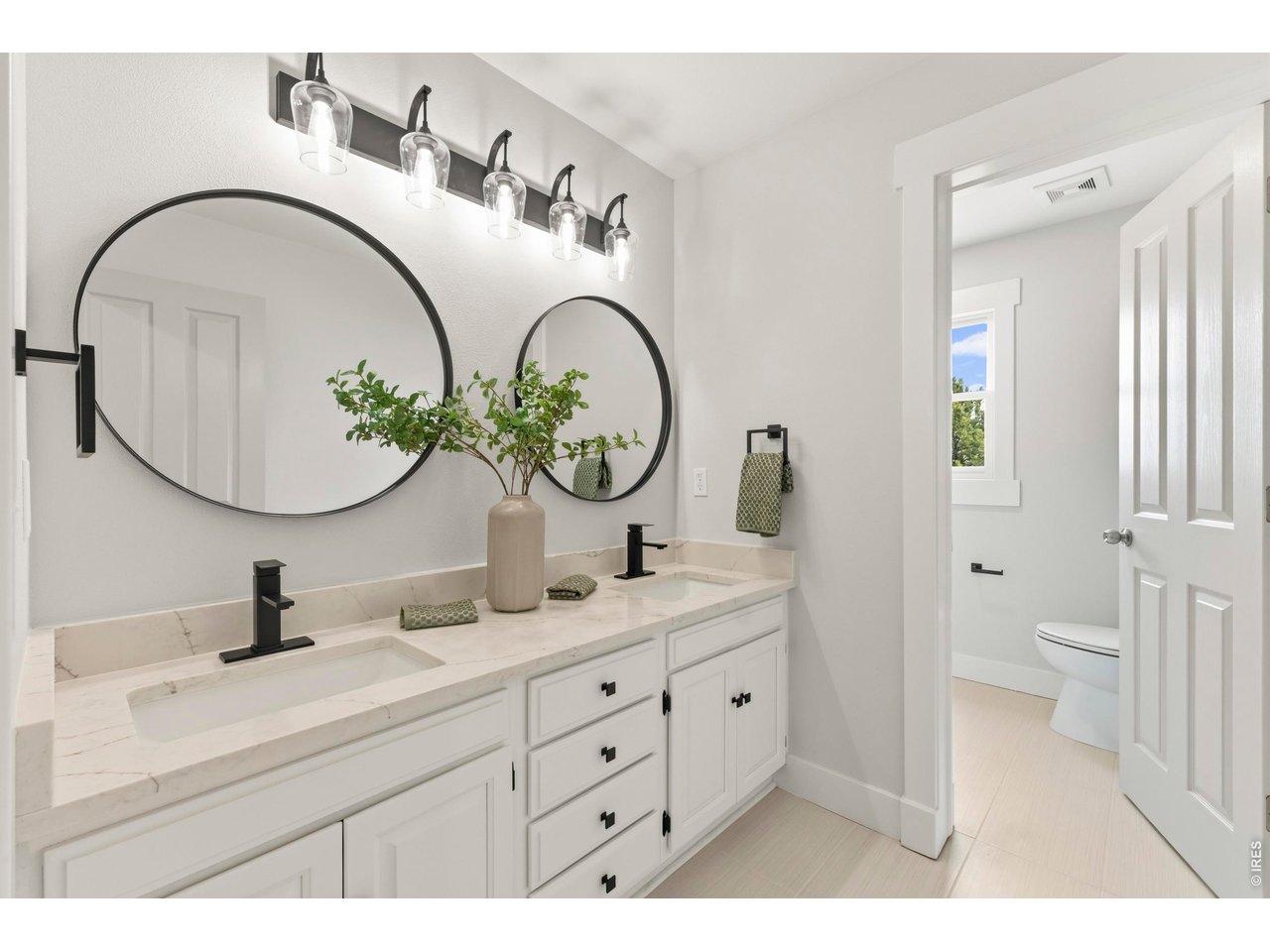 7766 Park Ridge Circle Fort Collins, CO 80528 - Photo 31 of 43 Bath with dual vanities