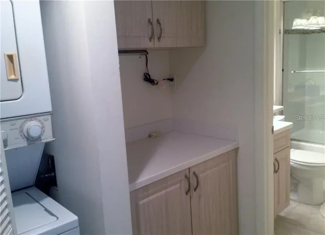 a bathroom with a sink and toilet