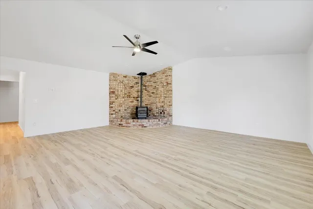 a bathroom with a double vanity sink and mirror