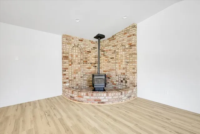 a bathroom with a toilet and a bathtub