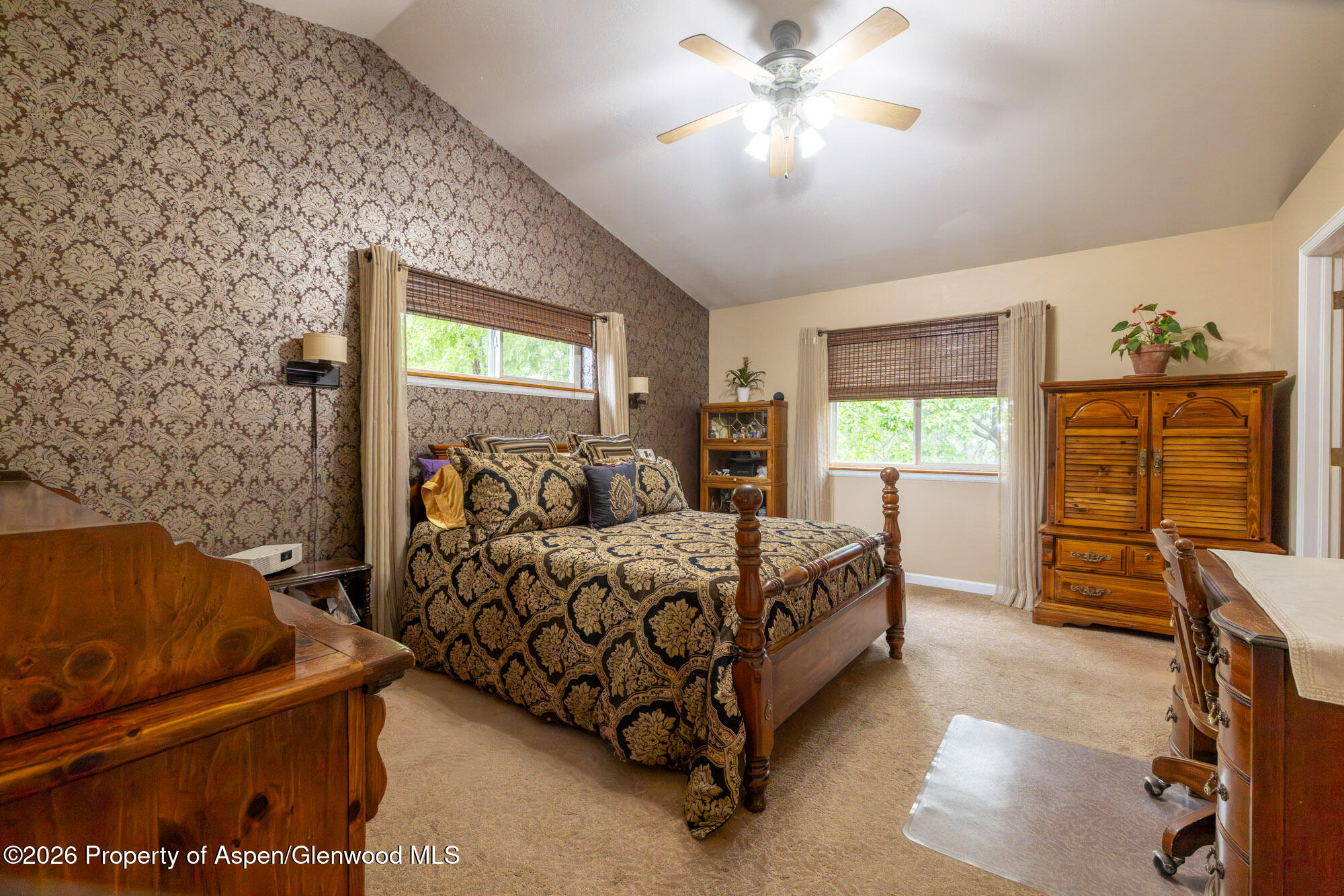 1335 Firethorn Drive Rifle, CO 81650 - Photo 13 of 30 a bed room with a bed and a window