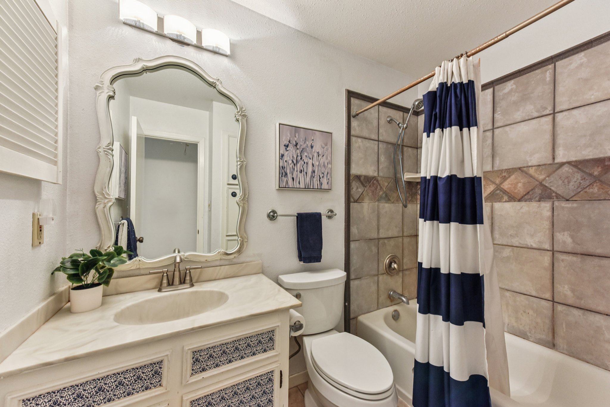 111 Post Oak Lane Elgin, TX 78621 - Photo 17 of 39 a bathroom with a sink toilet and shower