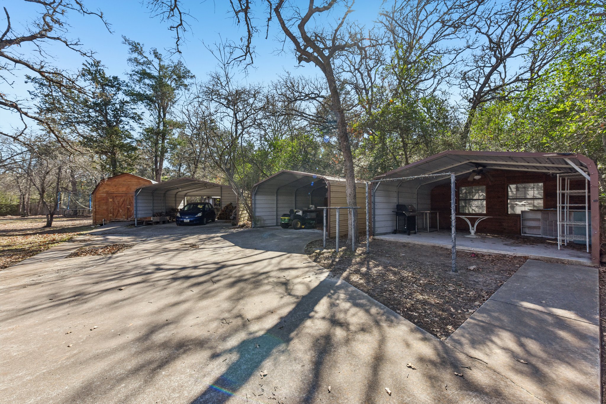 111 Post Oak Lane Elgin, TX 78621 - Photo 21 of 39 a front view of a house with a yard and garage