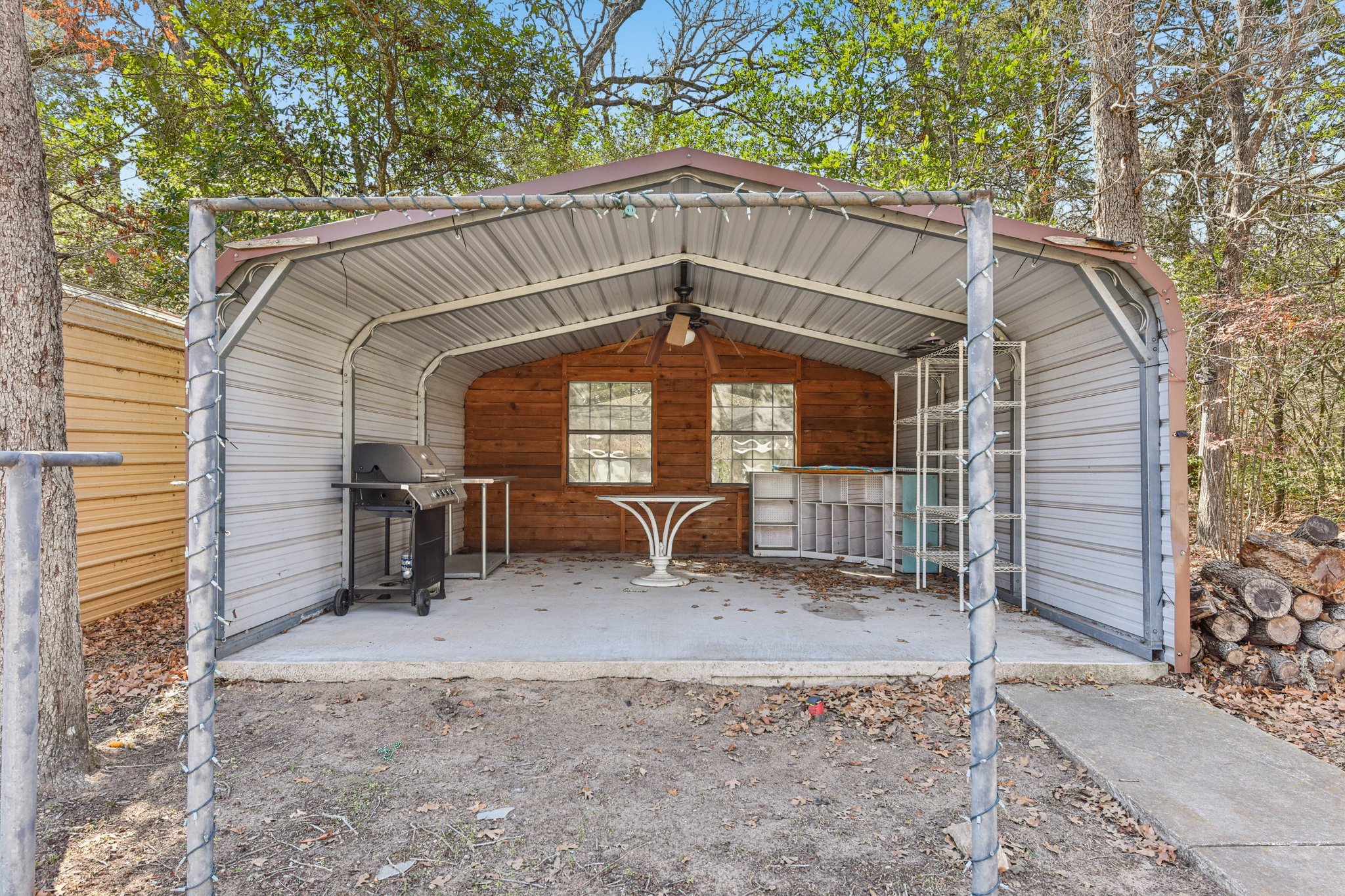 111 Post Oak Lane Elgin, TX 78621 - Photo 22 of 39 a view of a house with a yard and furniture