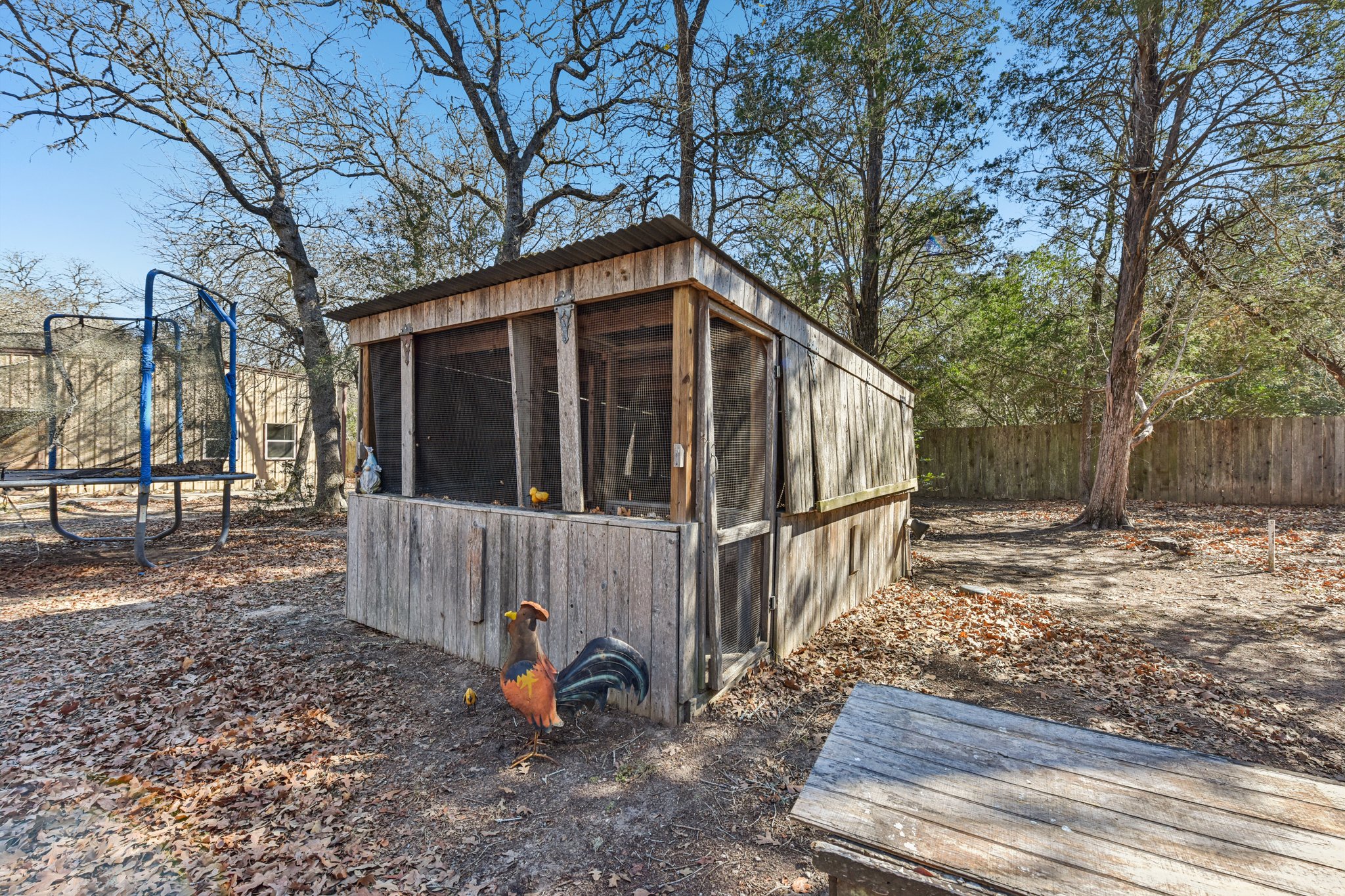 111 Post Oak Lane Elgin, TX 78621 - Photo 25 of 39 a view of a small house with a yard