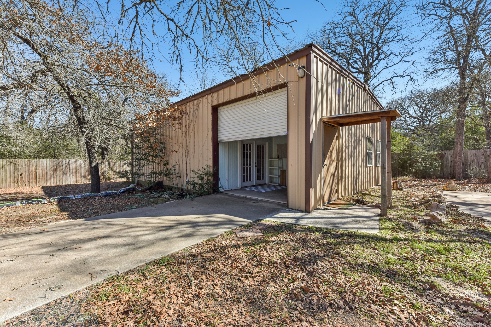 111 Post Oak Lane Elgin, TX 78621 - Photo 27 of 39 a front view of a house with a yard