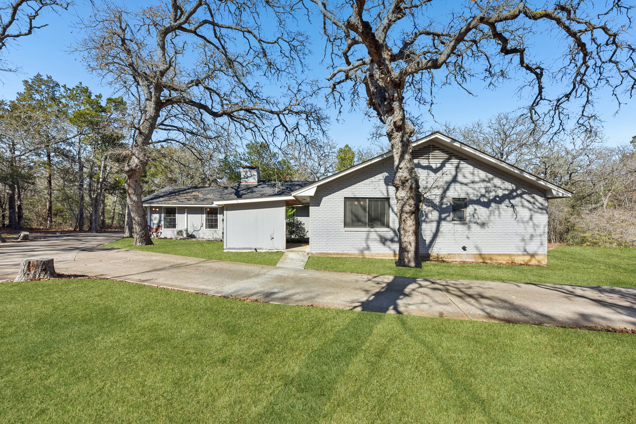 111 Post Oak Lane Elgin, TX 78621 - Photo 33 of 39 a view of a house with a yard