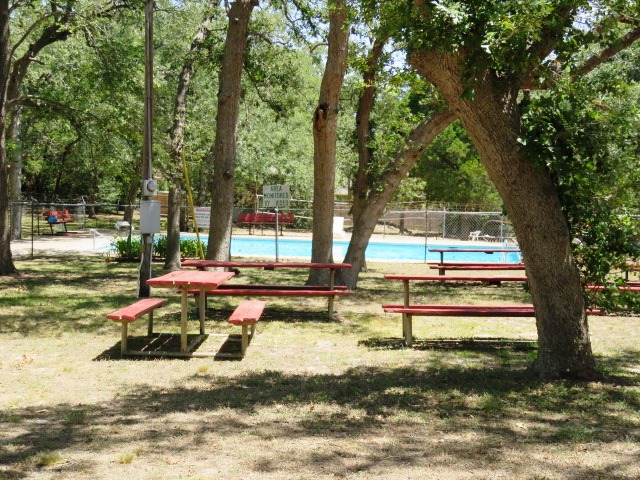 111 Post Oak Lane Elgin, TX 78621 - Photo 39 of 39 a view of a swimming pool with a patio
