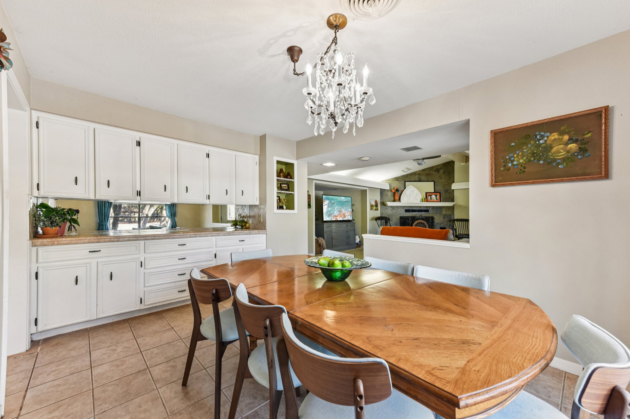 111 Post Oak Lane Elgin, TX 78621 - Photo 7 of 39 a kitchen with stainless steel appliances granite countertop a dining table and chairs