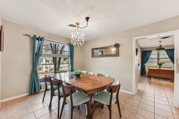 a view of a dining room with furniture