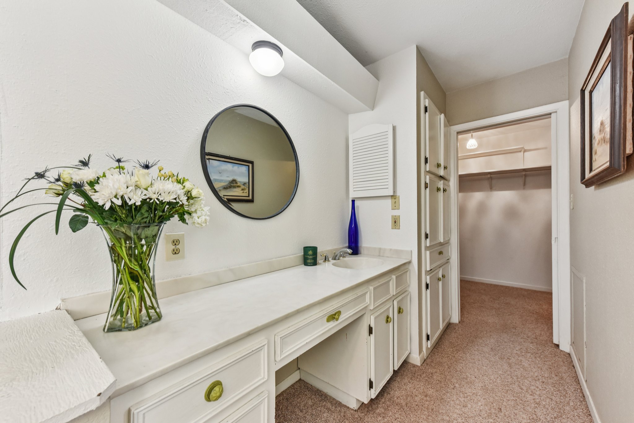 111 Post Oak Lane Elgin, TX 78621 - Photo 10 of 39 a bathroom with a double vanity sink and a mirror