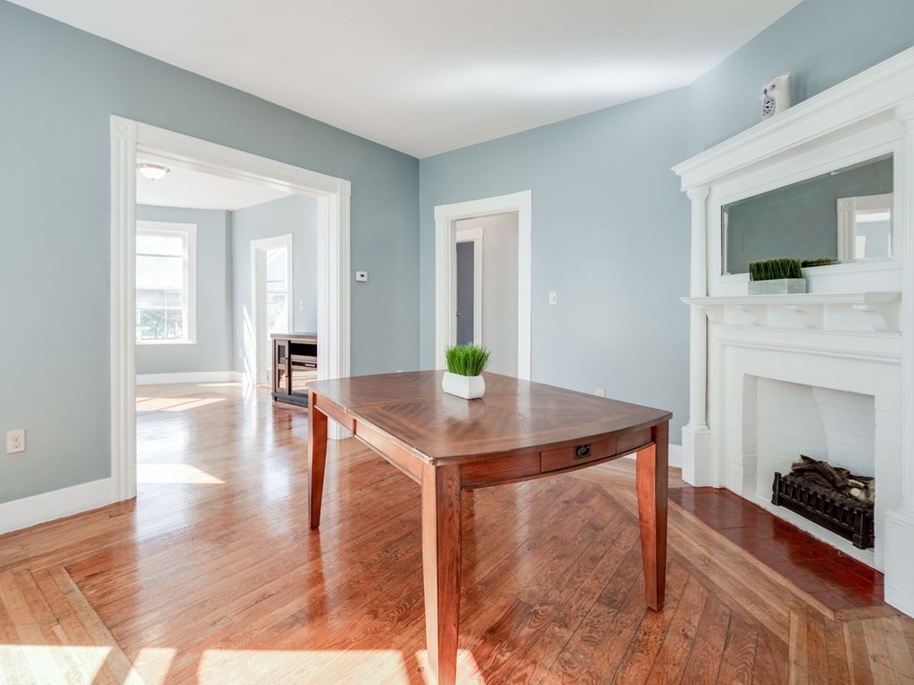 38 Cherry Street, Unit 2 Lynn, MA 01902 - Photo 18 of 40 a view of a livingroom with furniture and wooden floor