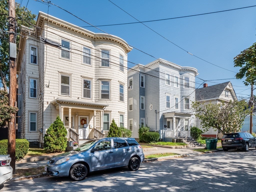 38 Cherry Street, Unit 2 Lynn, MA 01902 - Photo 37 of 40 a car parked in front of a building
