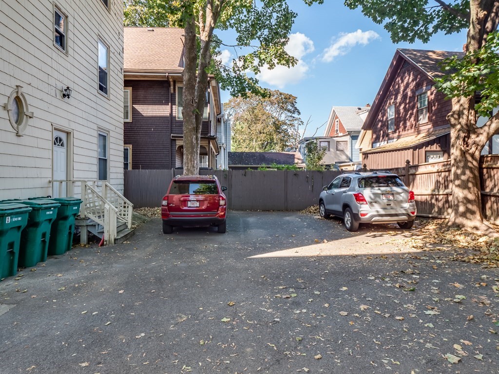 38 Cherry Street, Unit 2 Lynn, MA 01902 - Photo 40 of 40 a car parked in front of a house