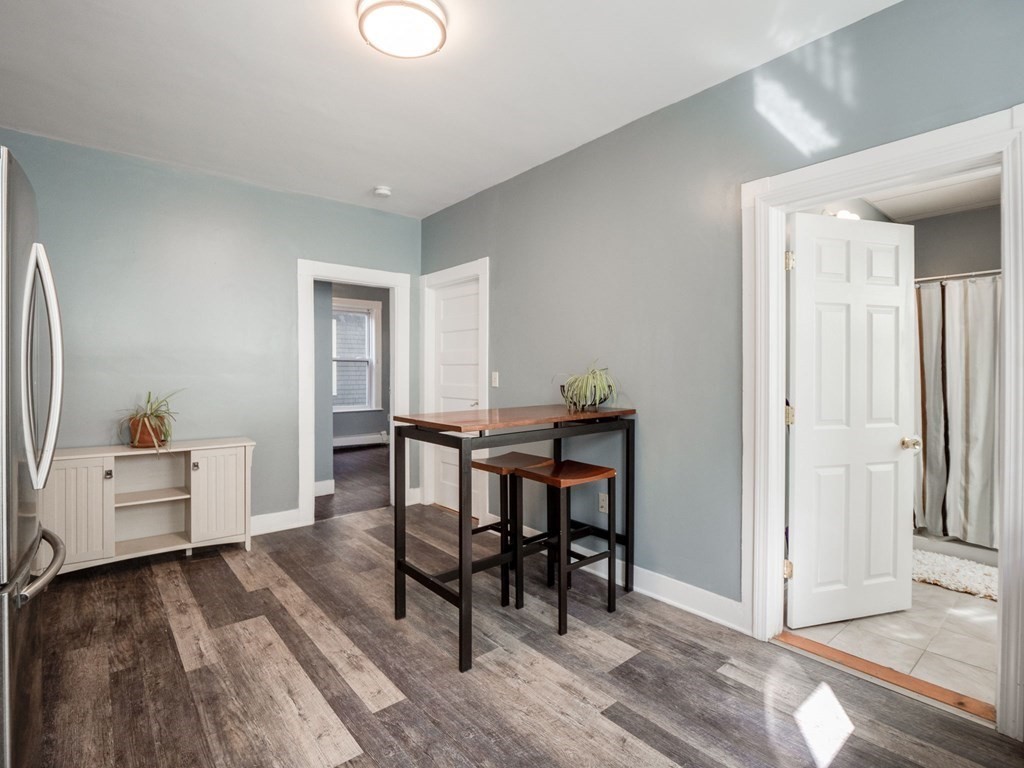 38 Cherry Street, Unit 2 Lynn, MA 01902 - Photo 9 of 40 a workspace with furniture and window