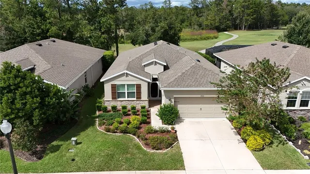 a aerial view of a house with garden