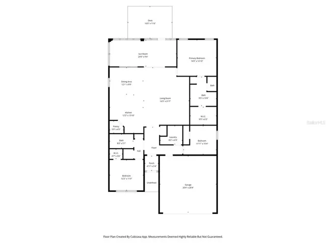 a view of a room with wooden floor and a window