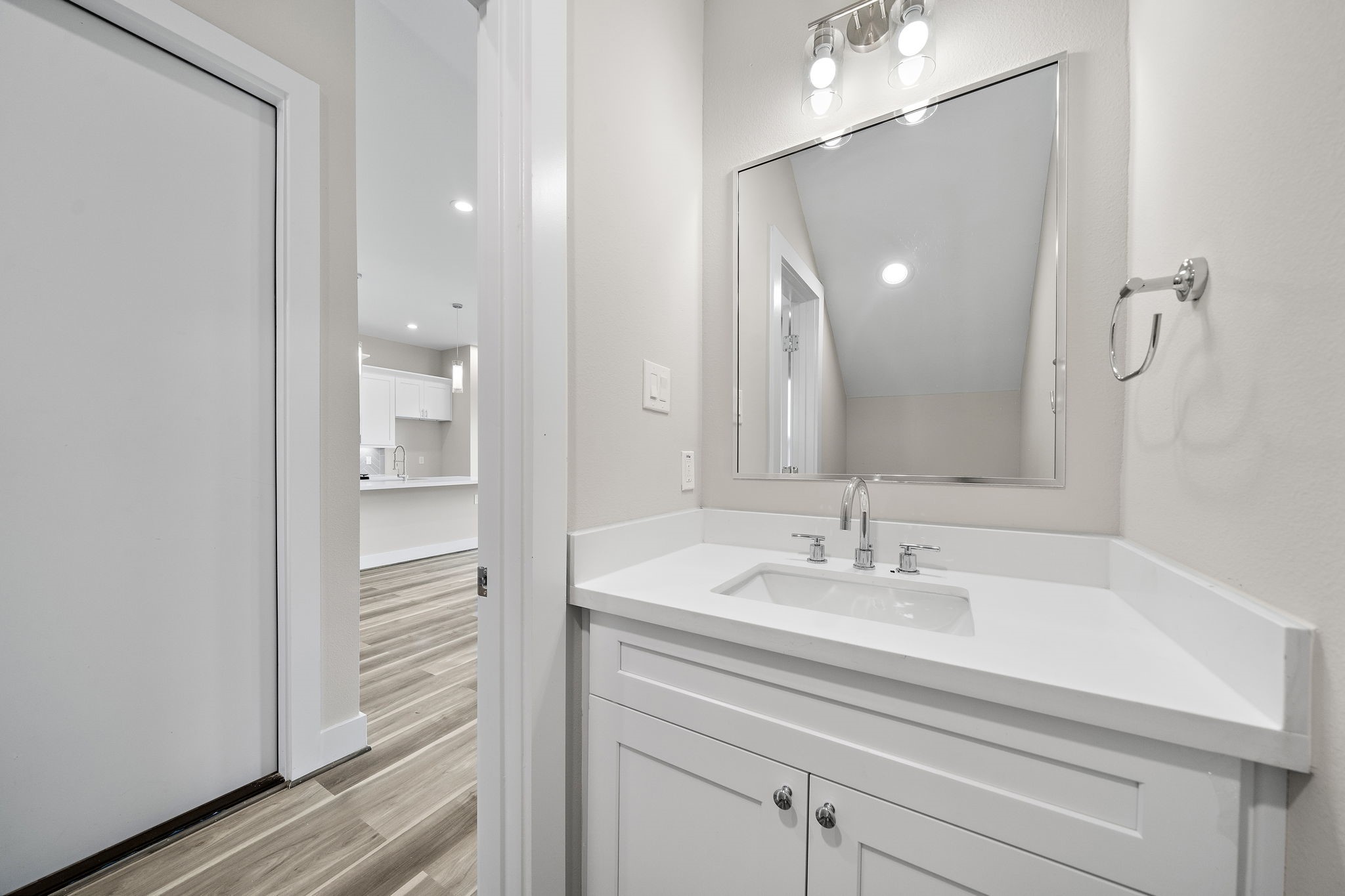7510 Sandle Street Houston, TX 77088 - Photo 18 of 26 a bathroom with a sink and a mirror