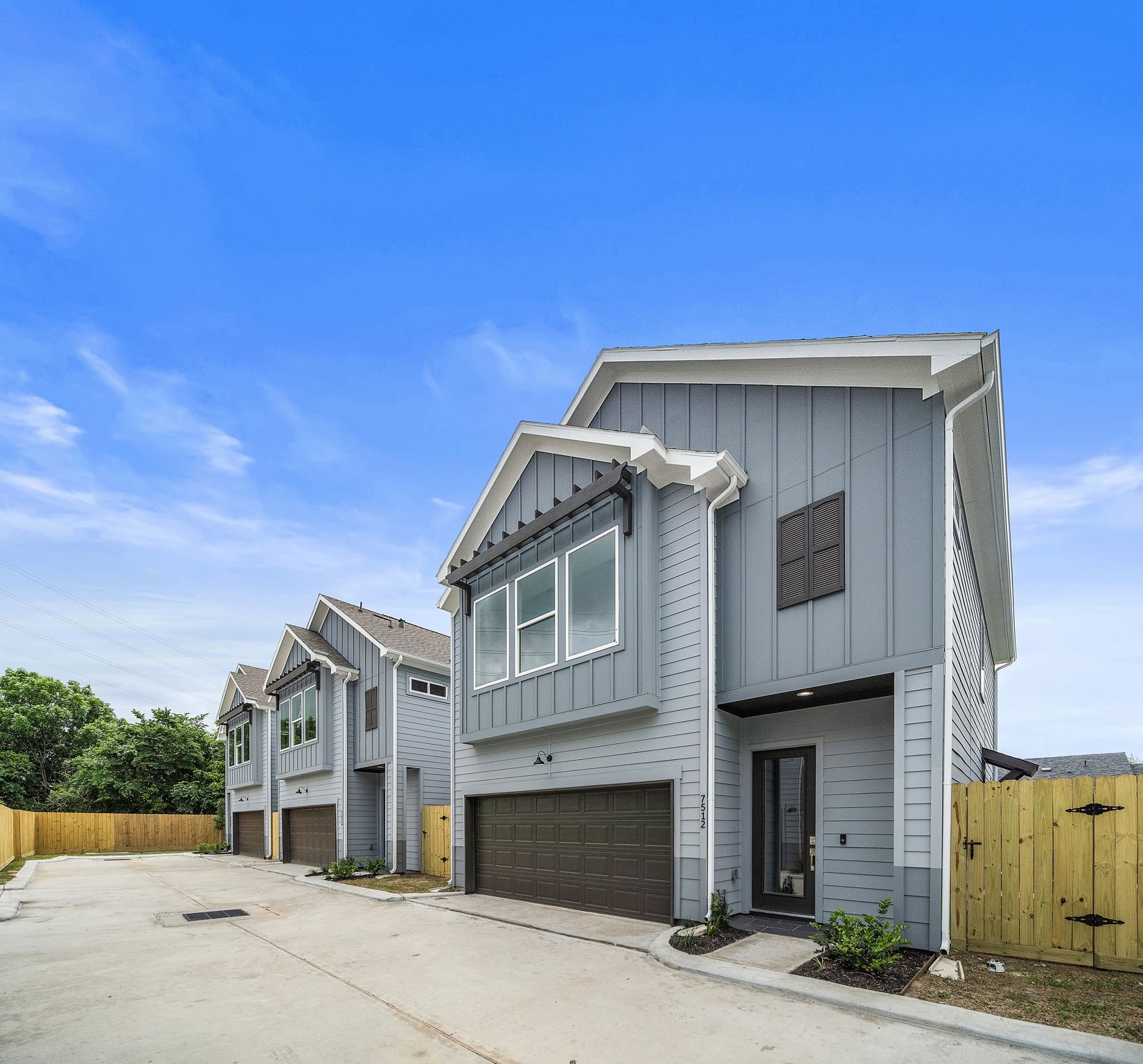 7510 Sandle Street Houston, TX 77088 - Photo 2 of 26 a front view of a house with a yard