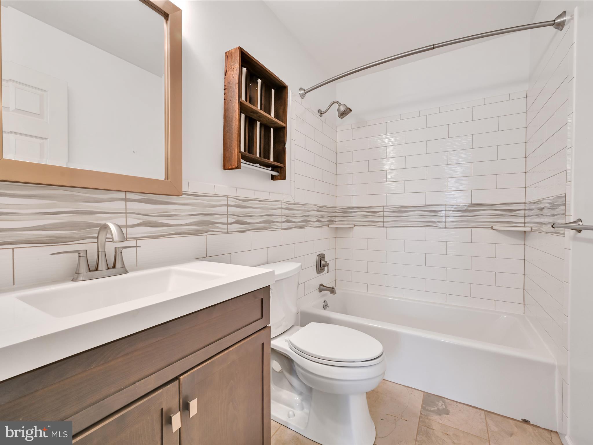 2602 Andrew Drive Sinking Spring, PA 19608 - Photo 36 of 47 a bathroom with a sink a toilet and shower