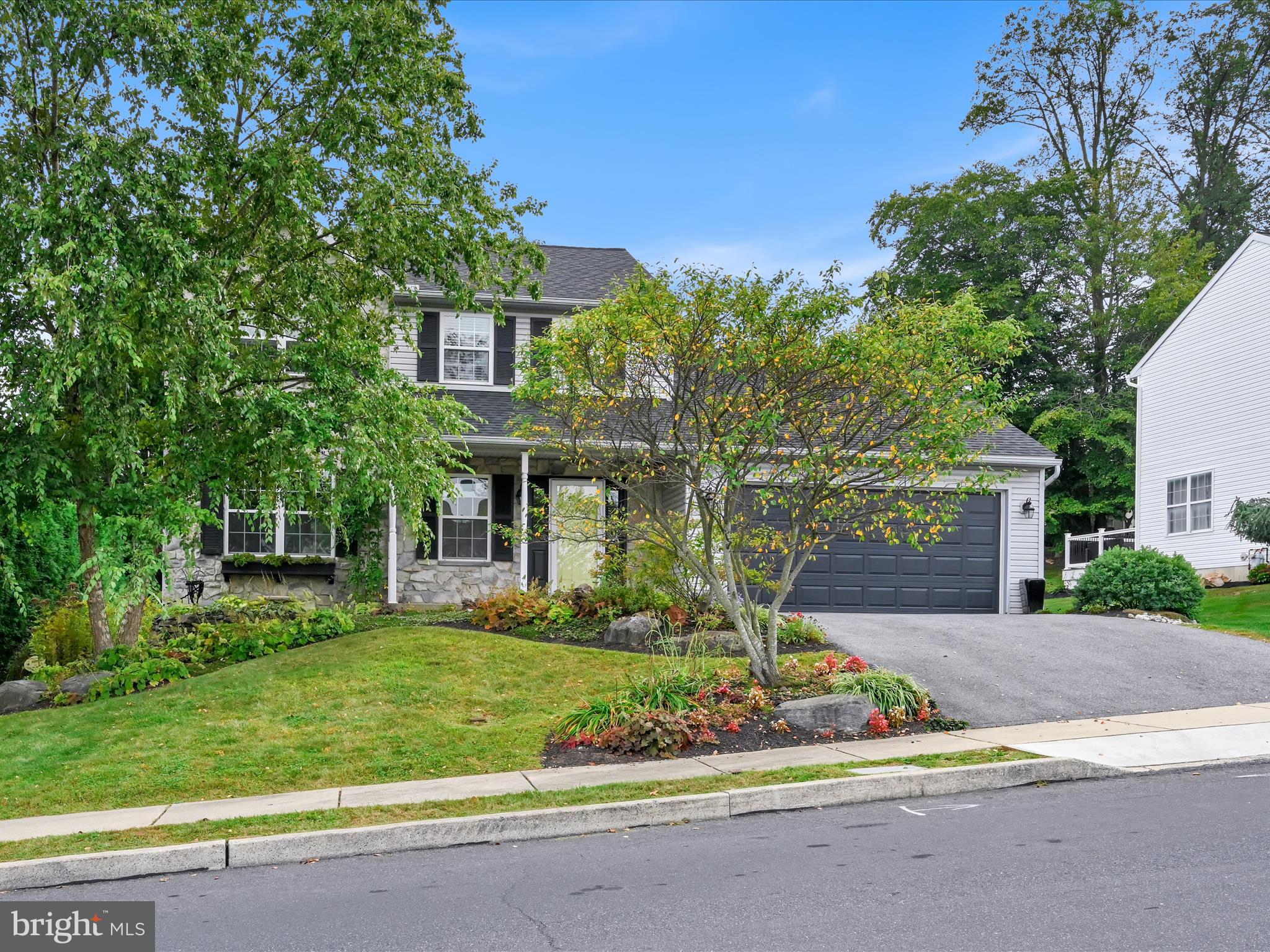 2602 Andrew Drive Sinking Spring, PA 19608 - Photo 41 of 47 front view of a house with a yard