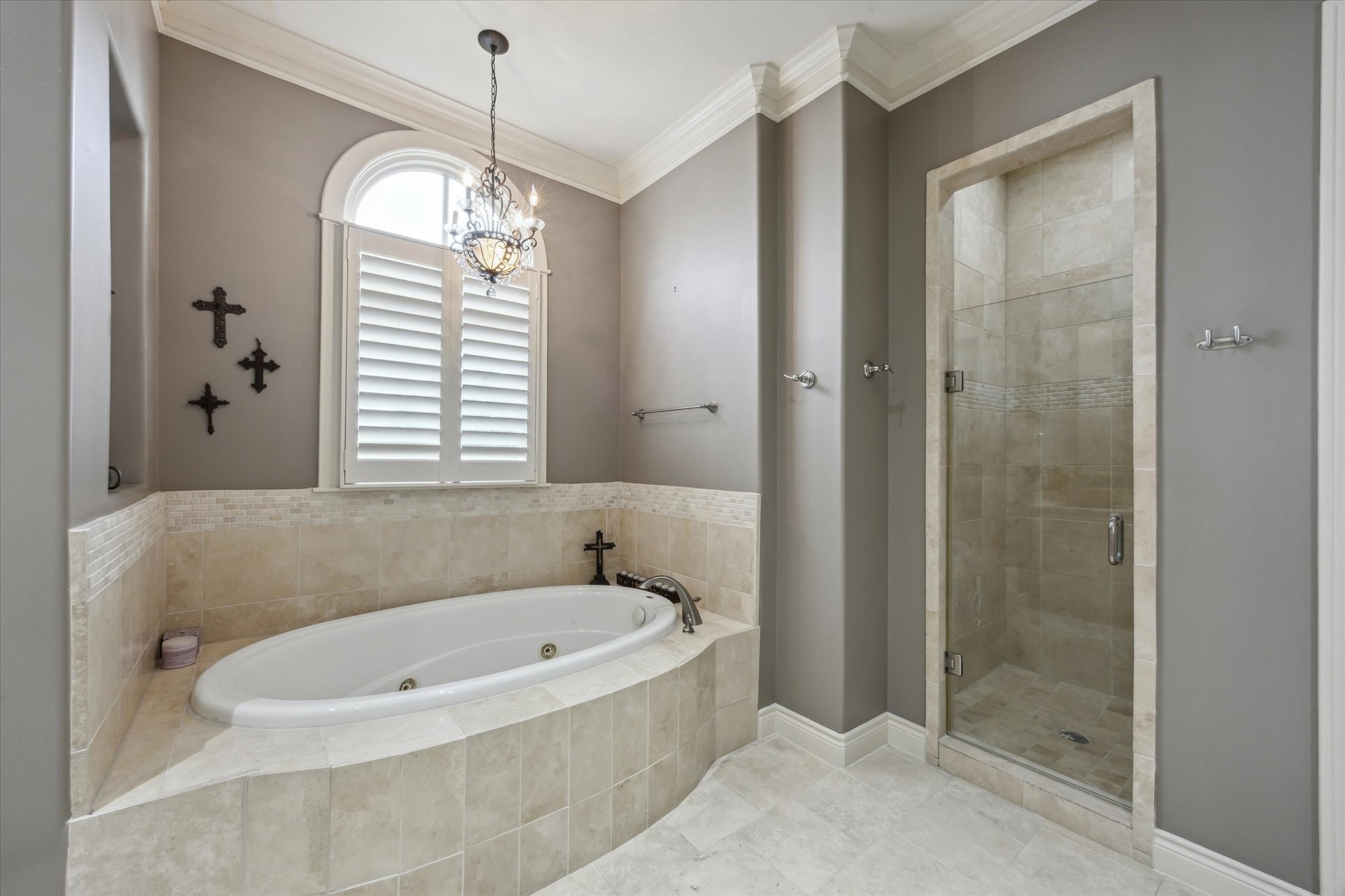 2405 Richton Street Houston, TX 77098 - Photo 17 of 24 a bathroom with a bathtub and shower
