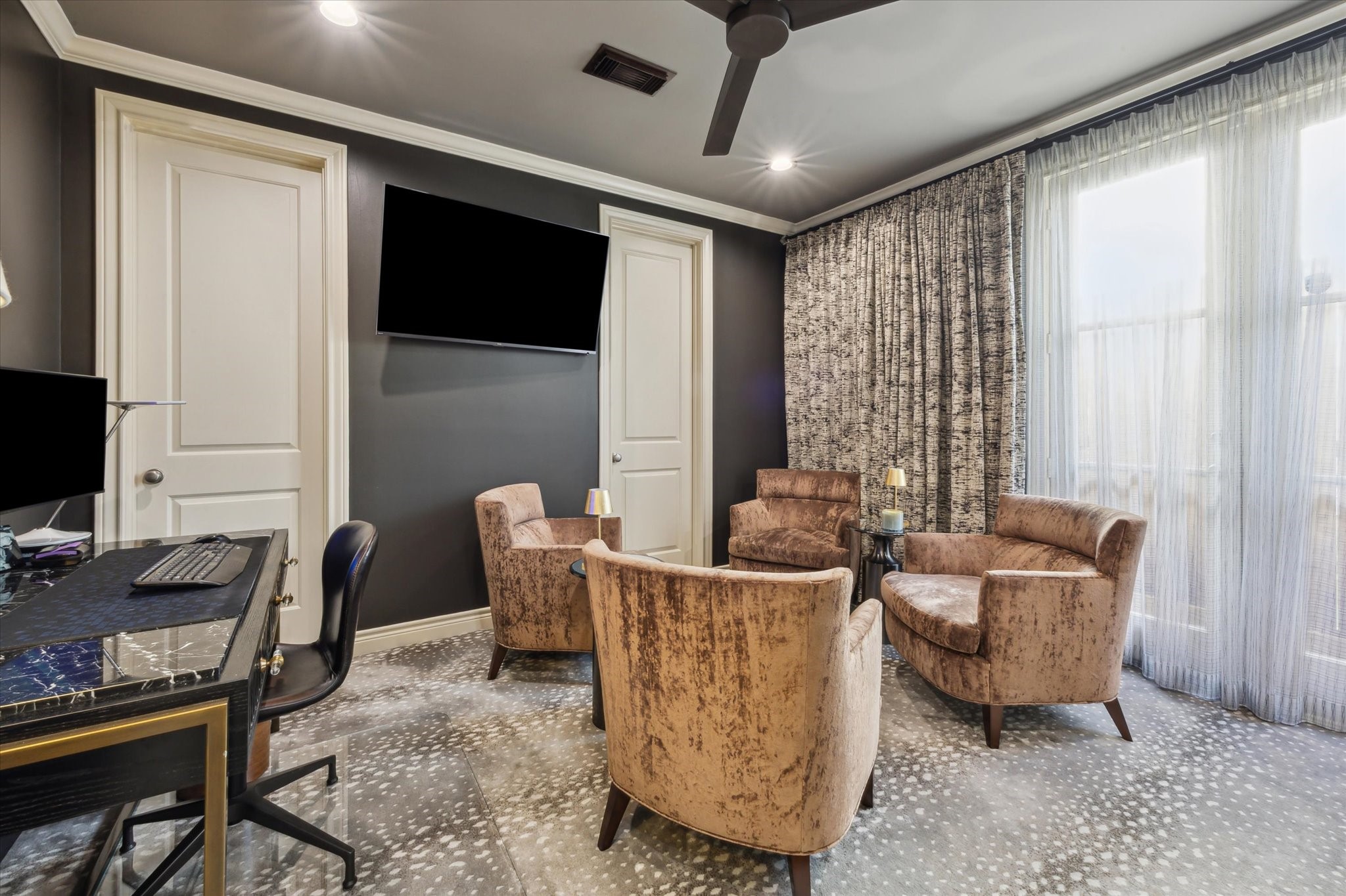 2405 Richton Street Houston, TX 77098 - Photo 4 of 24 a living room with furniture and a flat screen tv