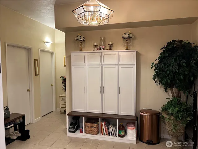 a kitchen with stainless steel appliances a refrigerator and a stove