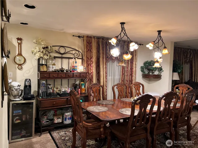 a view of a dining room with furniture