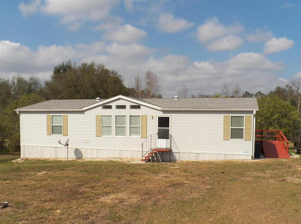 5909 West Grovepark Road Dunnellon, FL 34433 - Photo 1 of 1 Front of Home