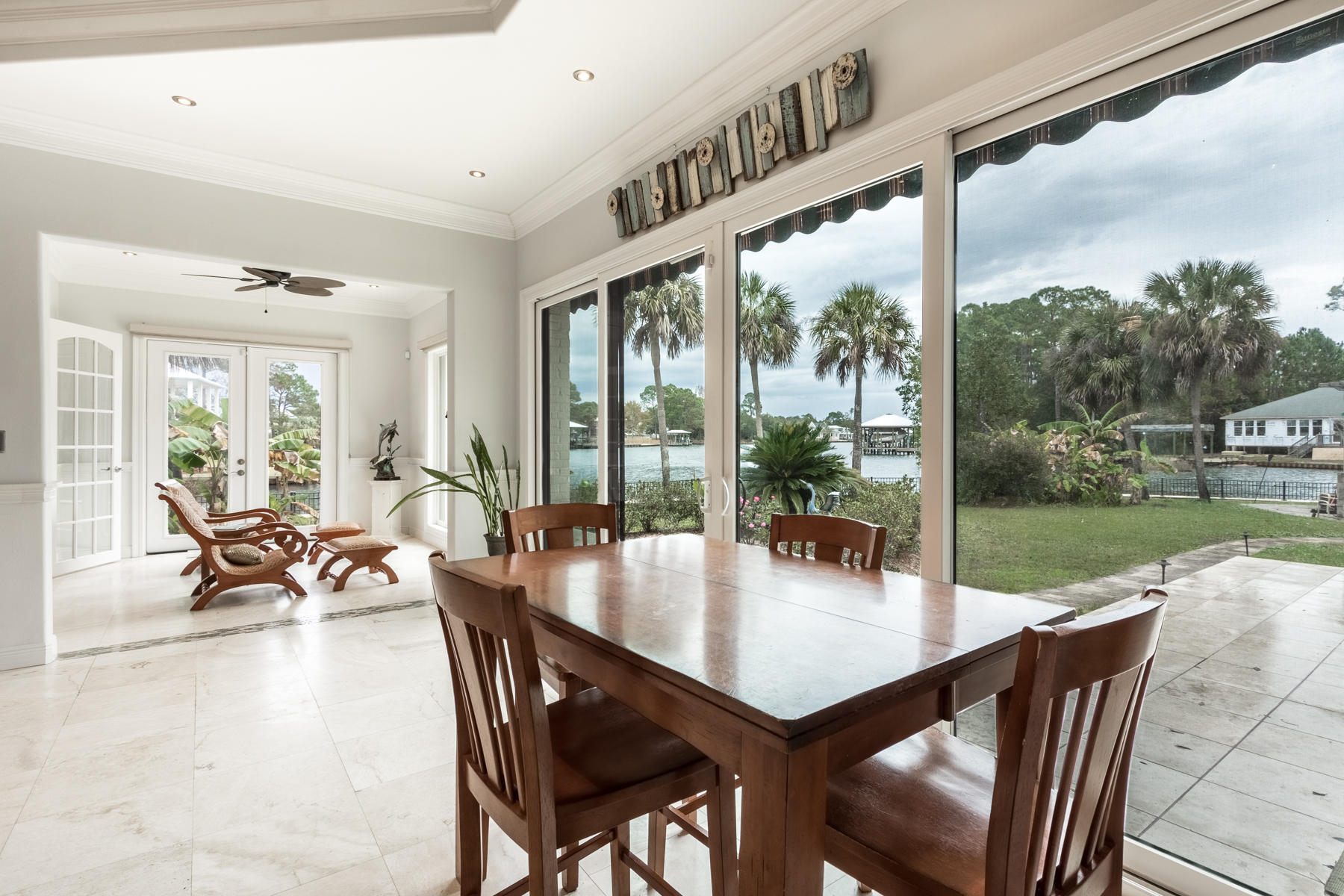 300 West Harborview Road Santa Rosa Beach, FL 32459 - Photo 29 of 48 a outdoor dining space with furniture and garden view