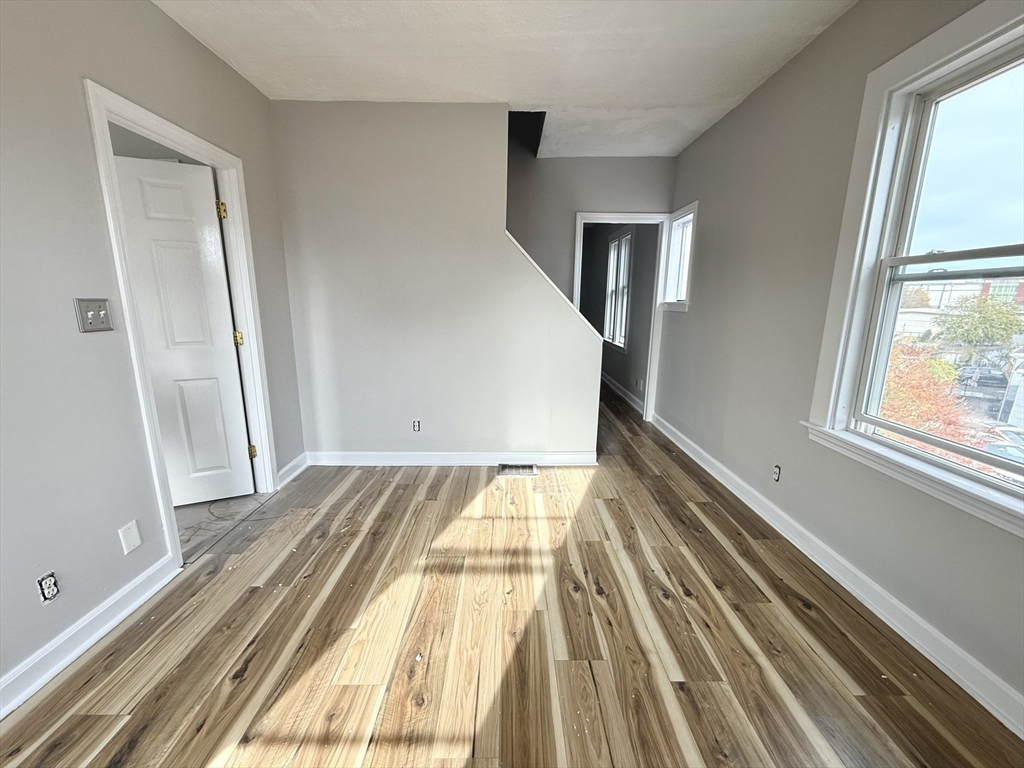 13 Brooks Avenue, Unit 2 Quincy, MA 02169 - Photo 9 of 15 a view of wooden floor