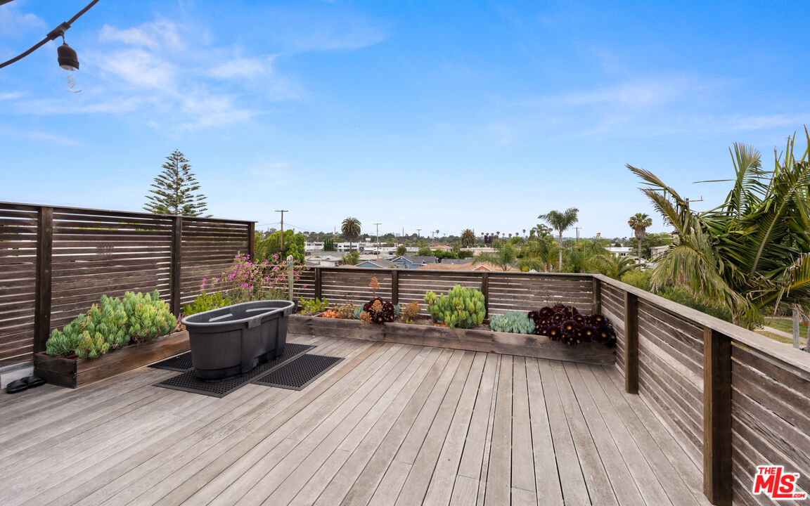 705 Sunset Avenue, Unit FRONT Venice, CA 90291 - Photo 13 of 17 a terrace with outdoor seating and city view