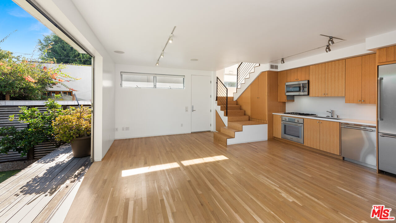705 Sunset Avenue, Unit FRONT Venice, CA 90291 - Photo 4 of 17 a view of a kitchen with a sink and dishwasher