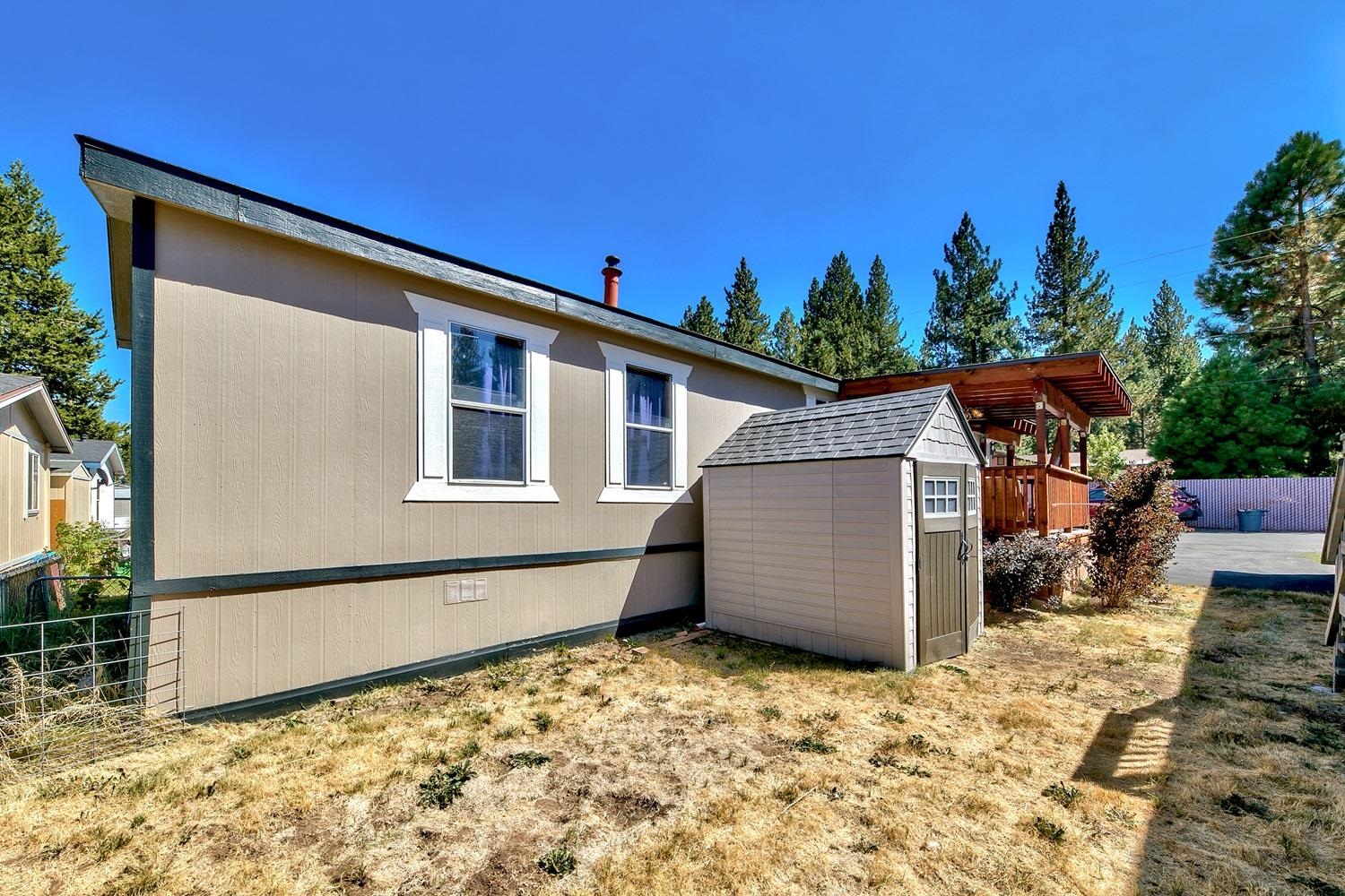 11070 Brockway Road, Unit 70 Truckee, CA 96161 - Photo 16 of 16 a backyard of a house with lots of green space
