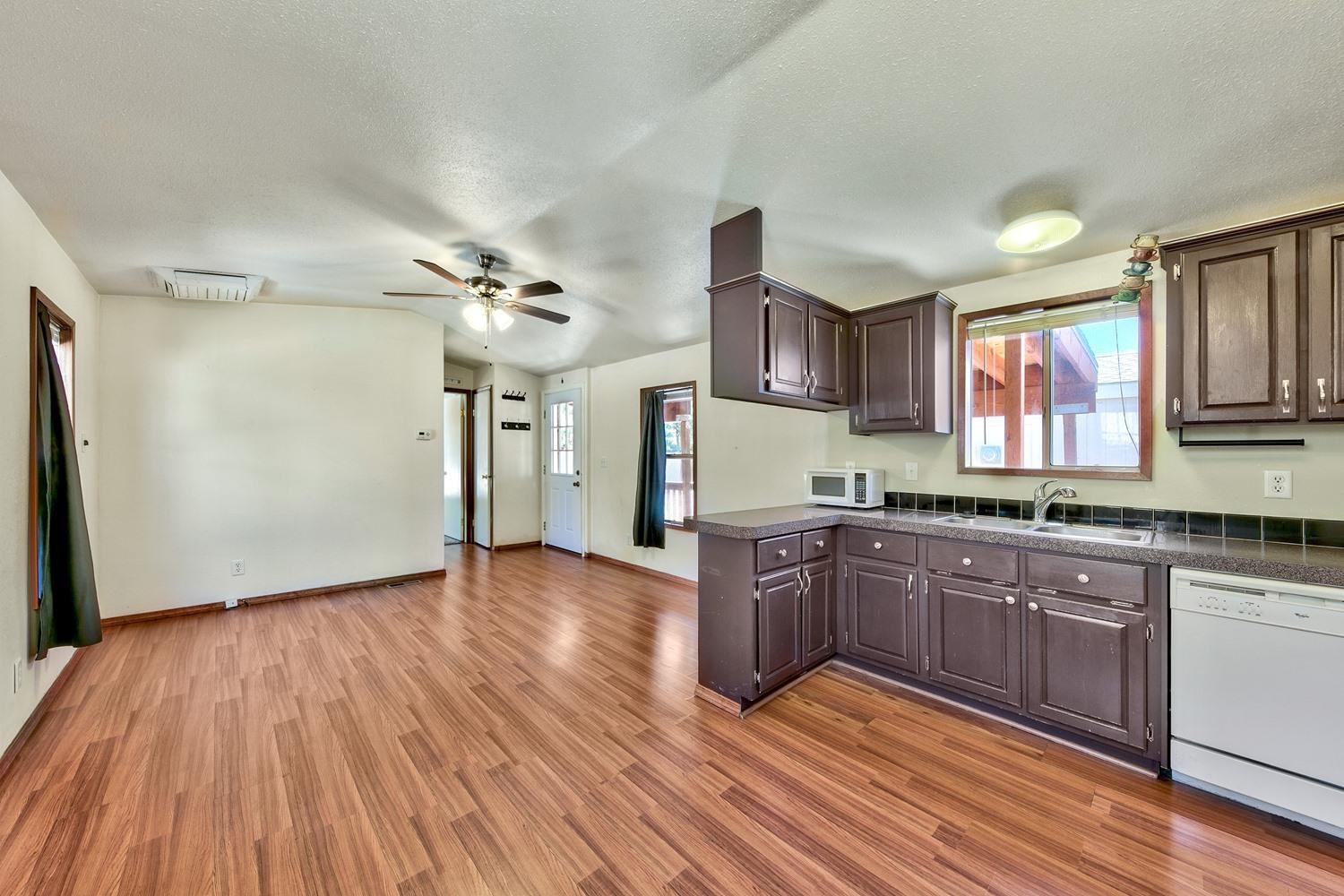 11070 Brockway Road, Unit 70 Truckee, CA 96161 - Photo 6 of 16 a kitchen with wooden floors and a sink