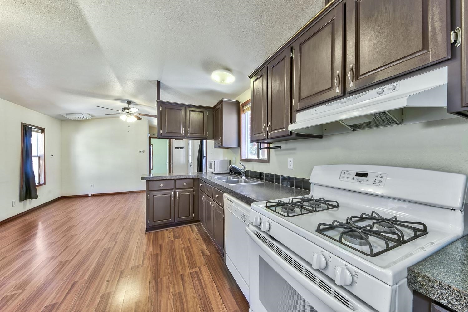 11070 Brockway Road, Unit 70 Truckee, CA 96161 - Photo 10 of 16 a kitchen with a stove and a wooden floors