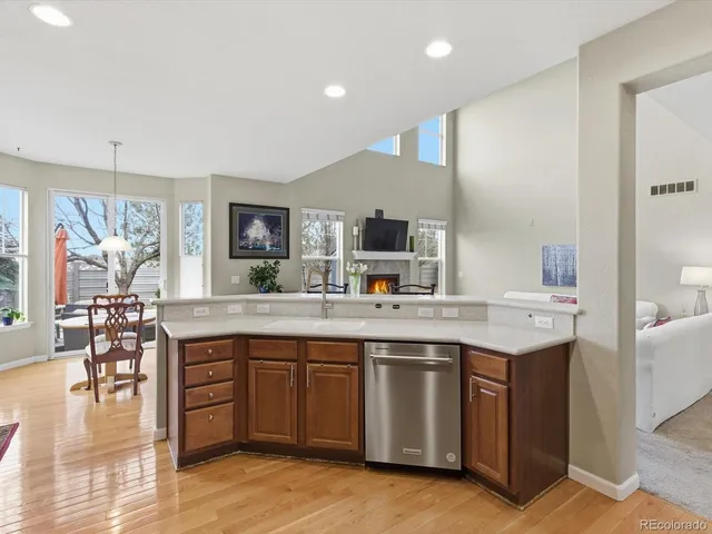 a spacious bathroom with a shower sink mirror and toilet