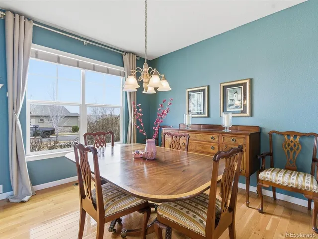 a kitchen with stainless steel appliances granite countertop a refrigerator stove and sink