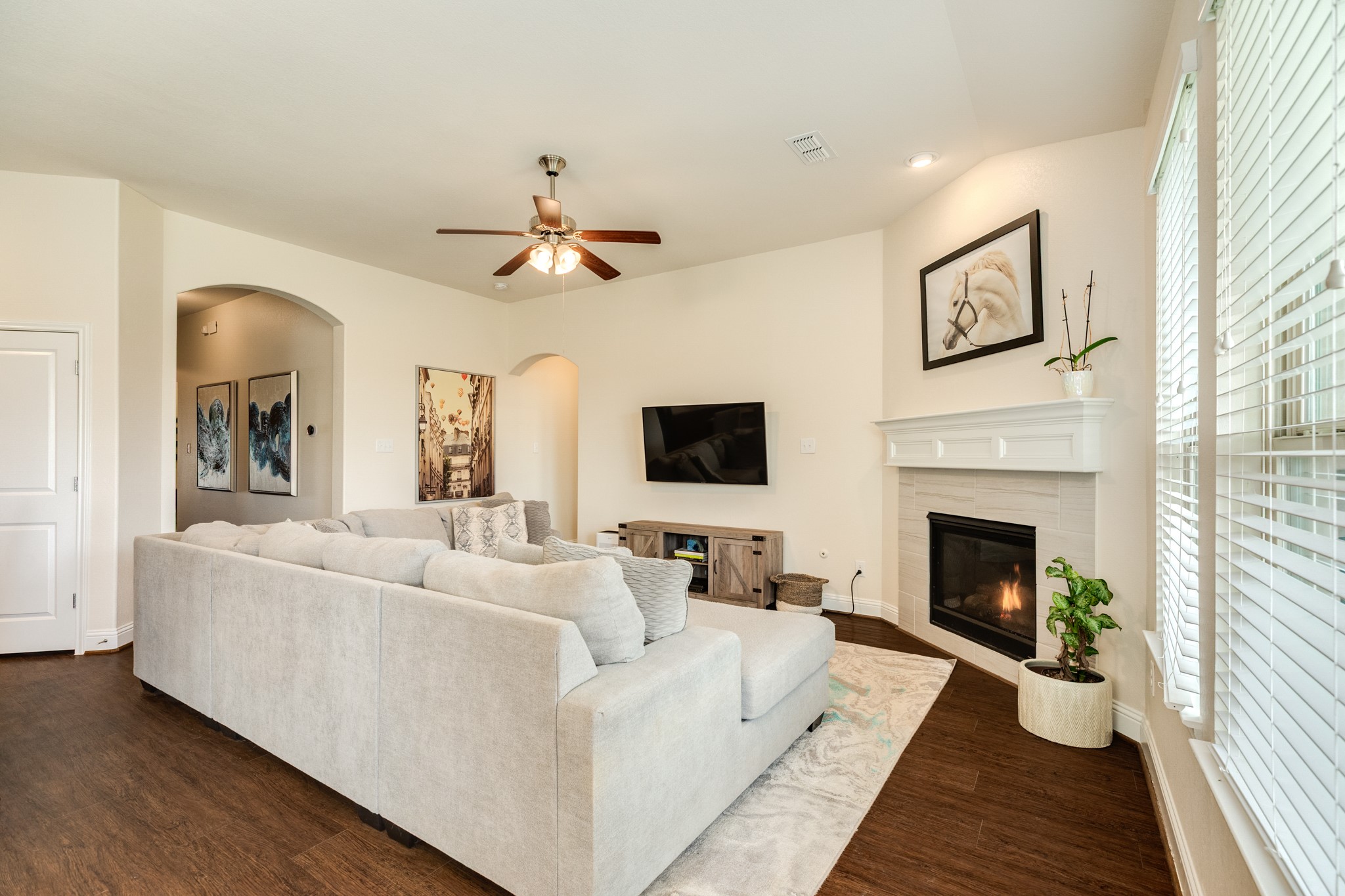 3519 Bay Drive Rosharon, TX 77583 - Photo 12 of 49 Beautifully maintained fireplace centerpiece with durable, low-maintenance flooring throughout the main living area.