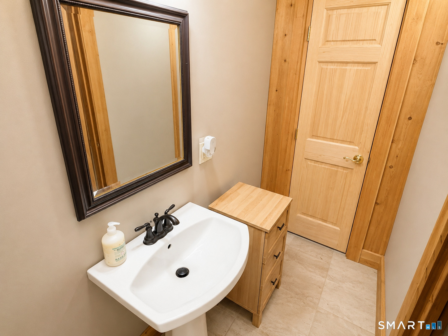 44 Pine Road Colebrook, CT 06021 - Photo 19 of 40 a bathroom with a sink a mirror and shower curtain